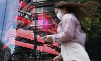 【环球财经】日本央行决定维持当前政策利率不变
